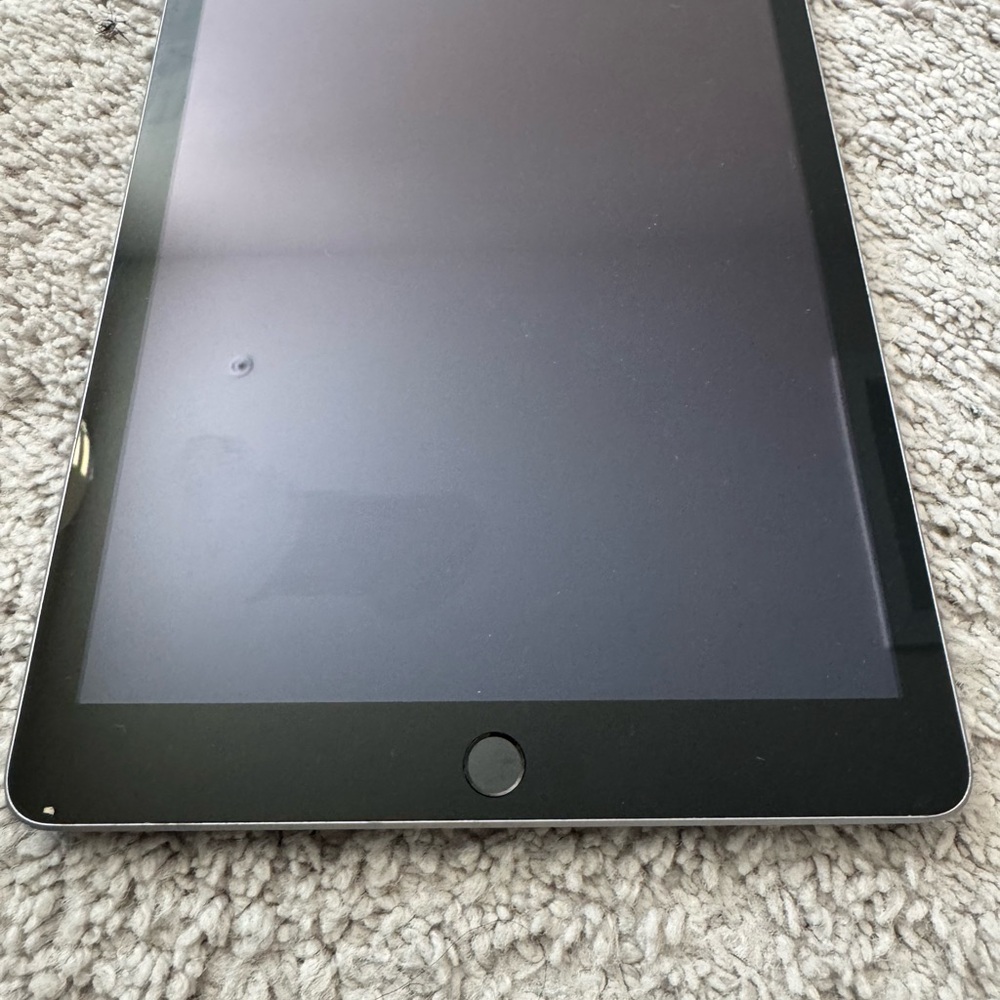 Apple Black iPad with Sleek Design and Thin Bezel
